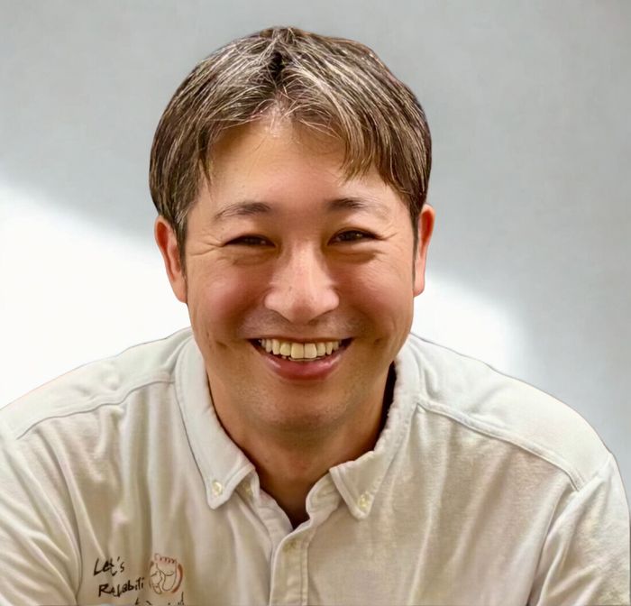 代表取締役 藤井孝光の笑顔のポートレート